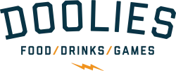 The image shows the logo for "DOOLIES" with the tagline "FOOD/DRINKS/GAMES" and a small orange lightning bolt underneath.
