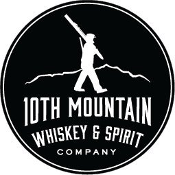 The image is the logo of 10th Mountain Whiskey & Spirit Company, featuring a silhouette of a person holding a ski over mountains.